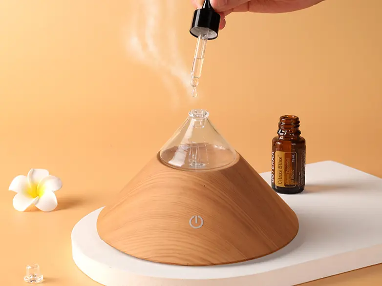 Cold air nebulizing diffuser using pure essential oils, designed for quiet waterless fragrance diffusion in home environments with OEM customization support