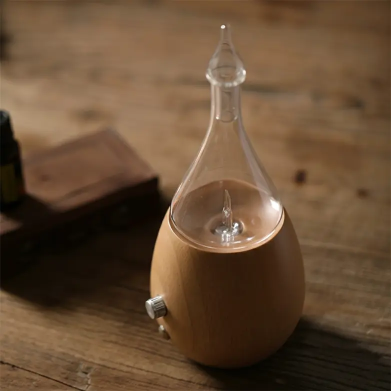 Wooden nebulizing diffuser for quiet waterless essential oil diffusion, suitable for home and car fragrance solutions with private label support