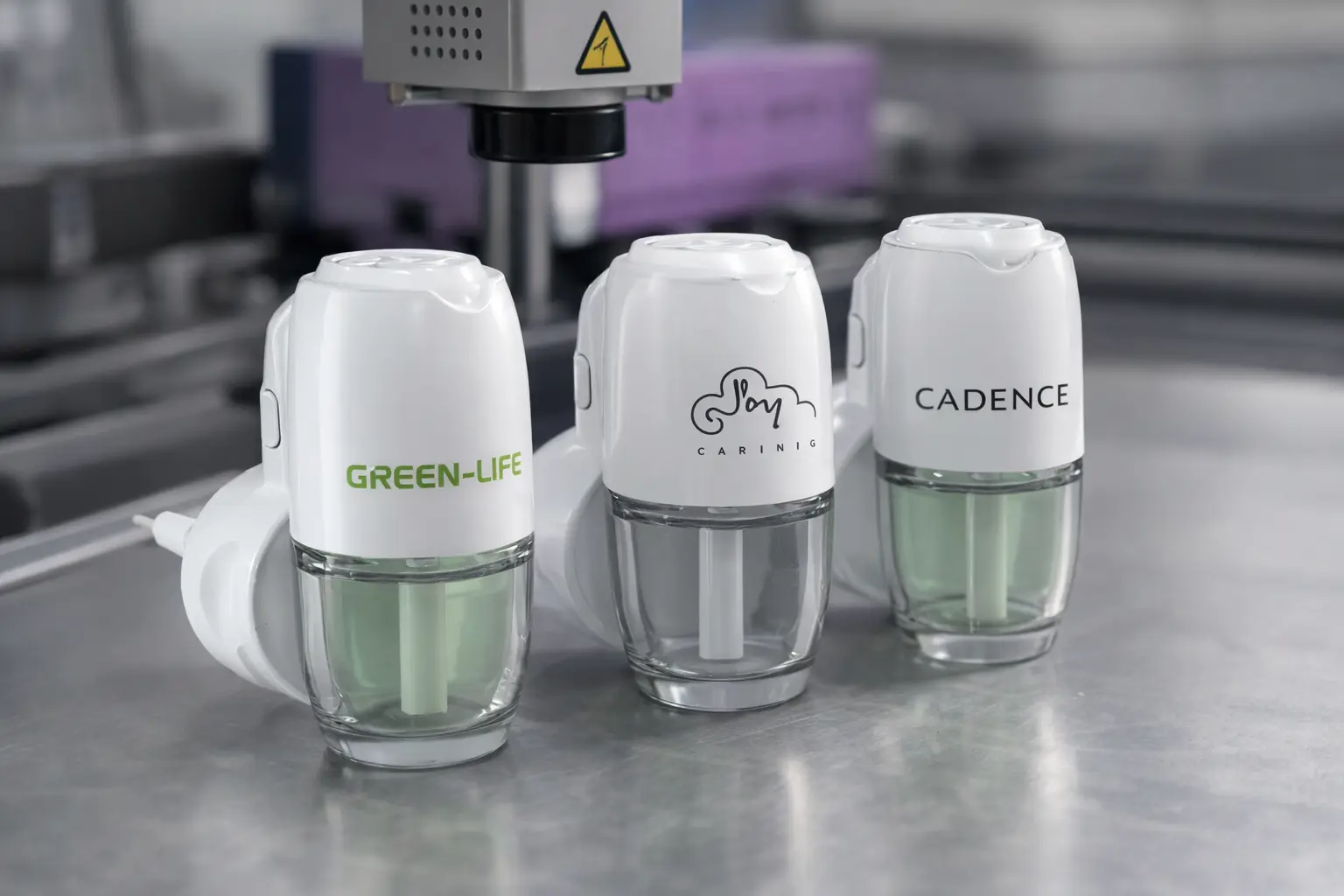 Custom plug-in air fresheners with different private label logos, demonstrating branding and logo application options by Green-Life.